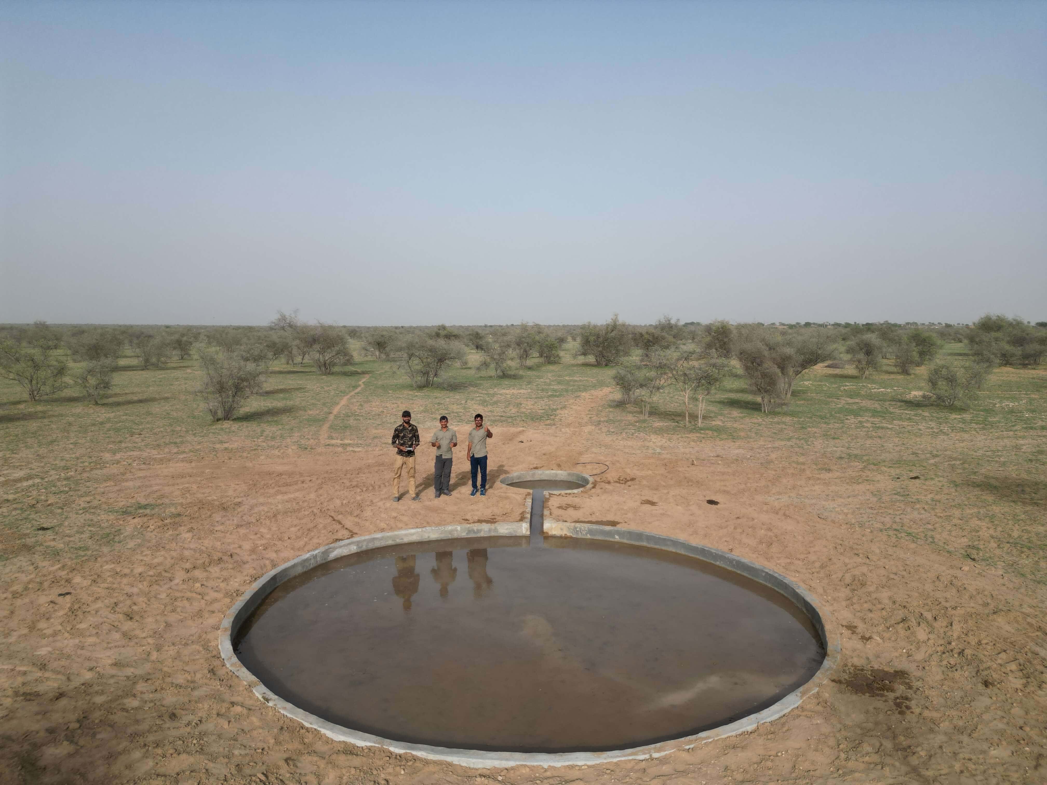 Radheshyam creating a water reservoir in the desert, one of over 100 he established for wildlife